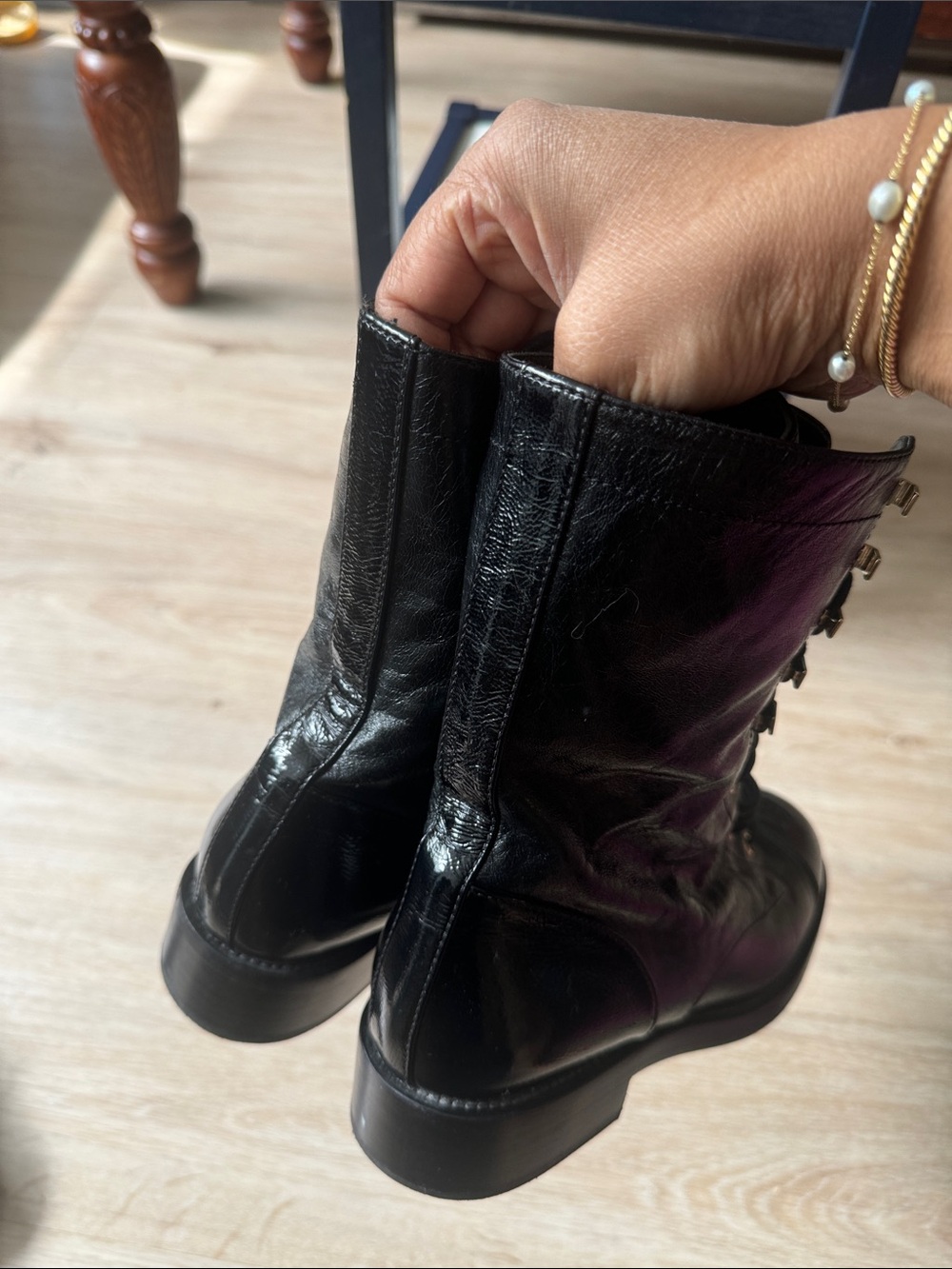 CHANEL Black Leather Lace-Up Combat Boots with Gold Accents - Picture 3 of 3